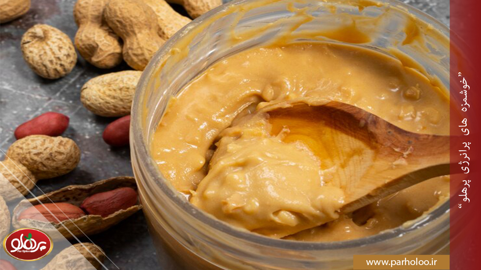 کره بادام زمینی گرم است یا سرد | پرهلو بهترین کره بادام زمینی برای افراد گرم مزاج | پرهلو